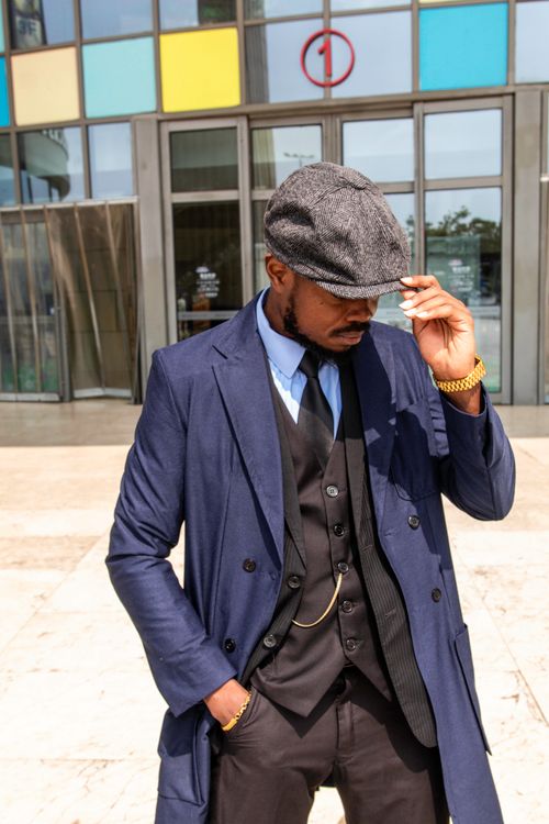 Free Elegant man poses in vintage attire, capturing the essence of 1950s fashion. Stock Photo