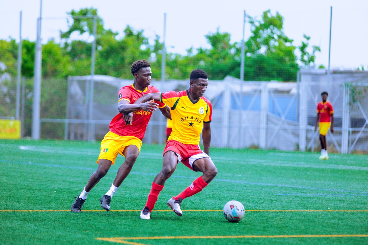 players engage passionately in a soccer match on an outdoor field show