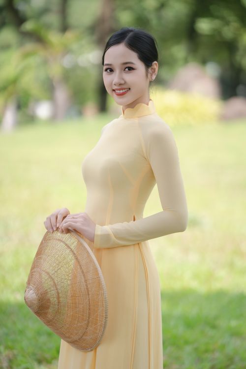 Young Woman in Traditional Dress Outdoors · Free Stock Photo