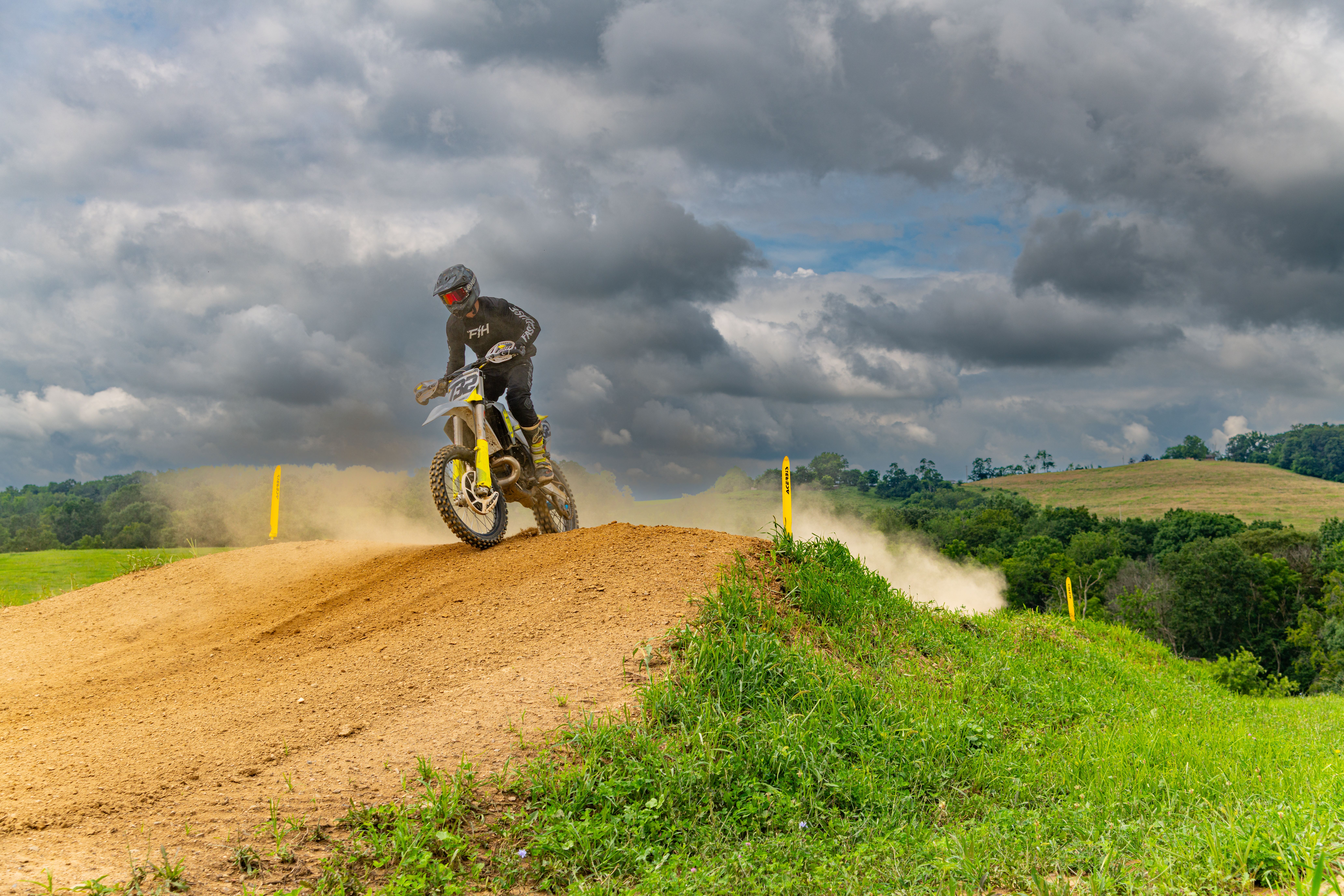 Dynamic Dirt Bike Racing on Pennsylvania Track · Free Stock Photo