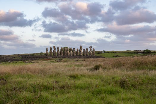 Majestic view of the Moai statues at Ahu Tongariki during sunset on Easter Island, Chile.