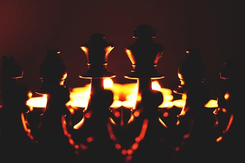 Gratis lagerfoto af levende lys, skakbrikker