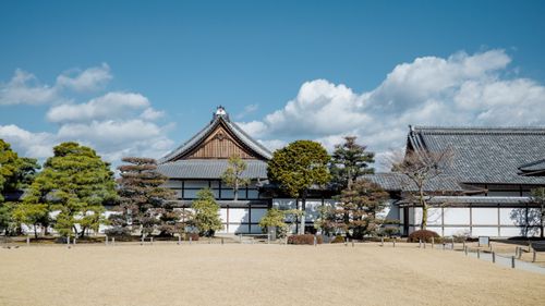 Free Beautiful Zen temple in Kyoto with traditional architecture under a bright blue sky. Stock Photo