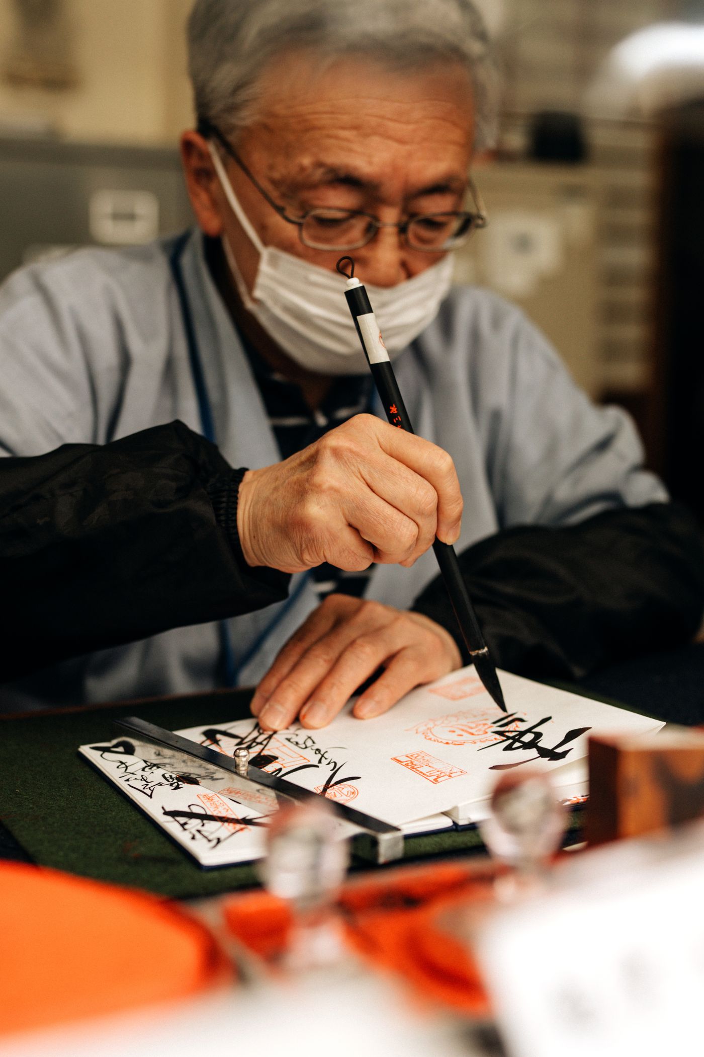 Artist practicing traditional Japanese calligraphy