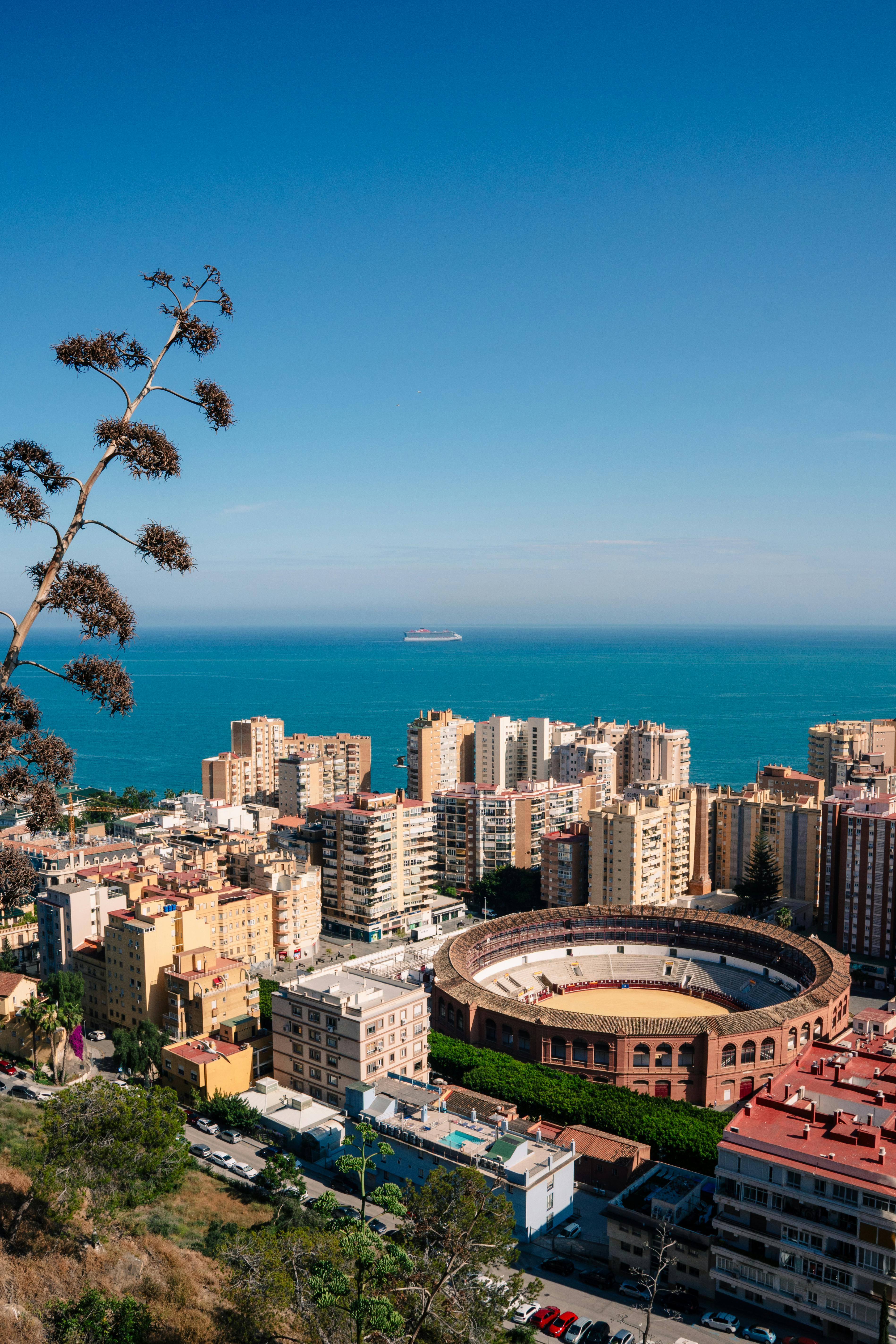 Explore Málaga's iconic bullring and coast from a breathtaking vantage point.