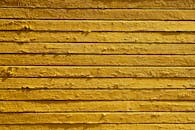 Textured Yellow Wooden Wall with Peeling Paint