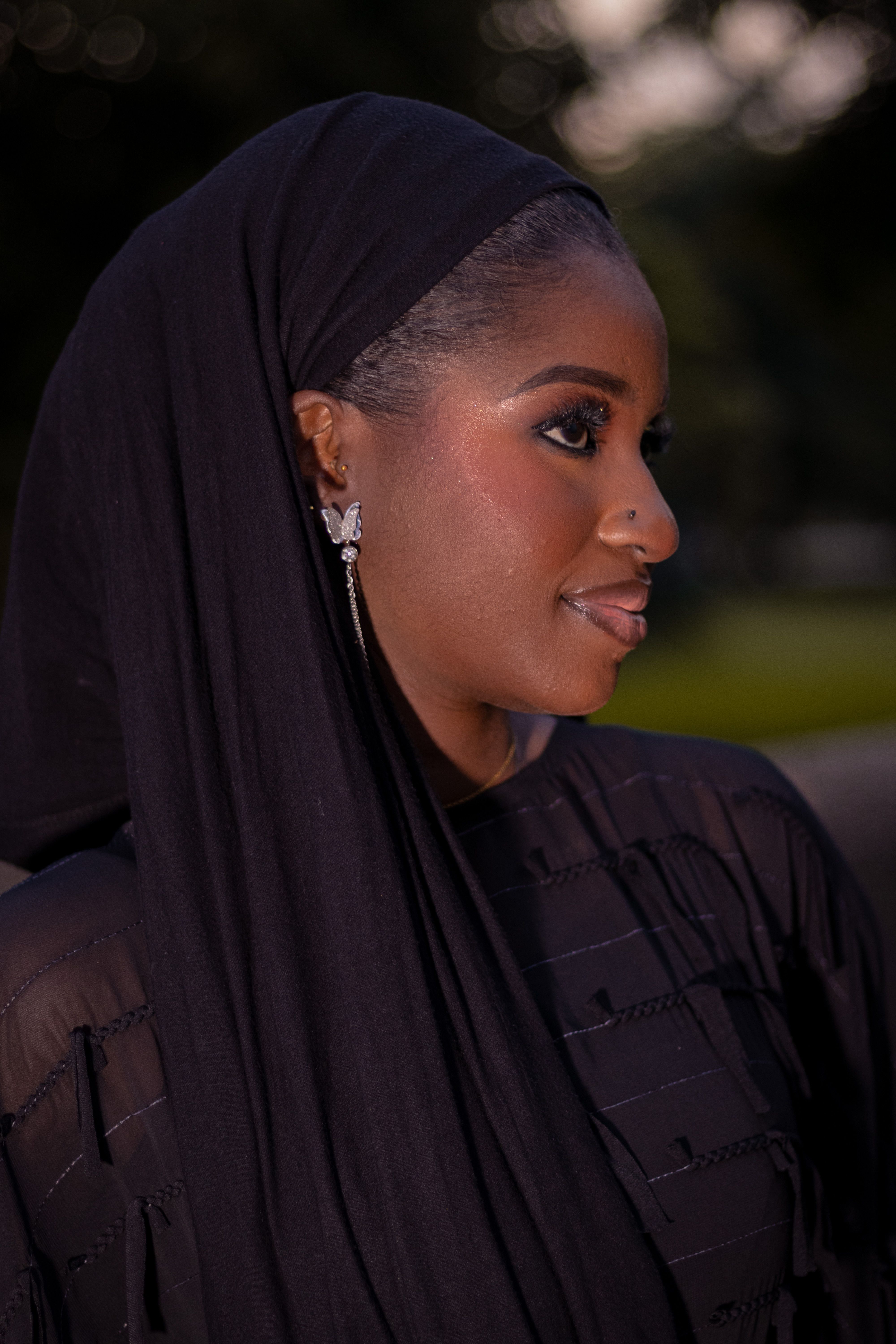 Elegant Portrait of Woman in Black Hijab · Free Stock Photo