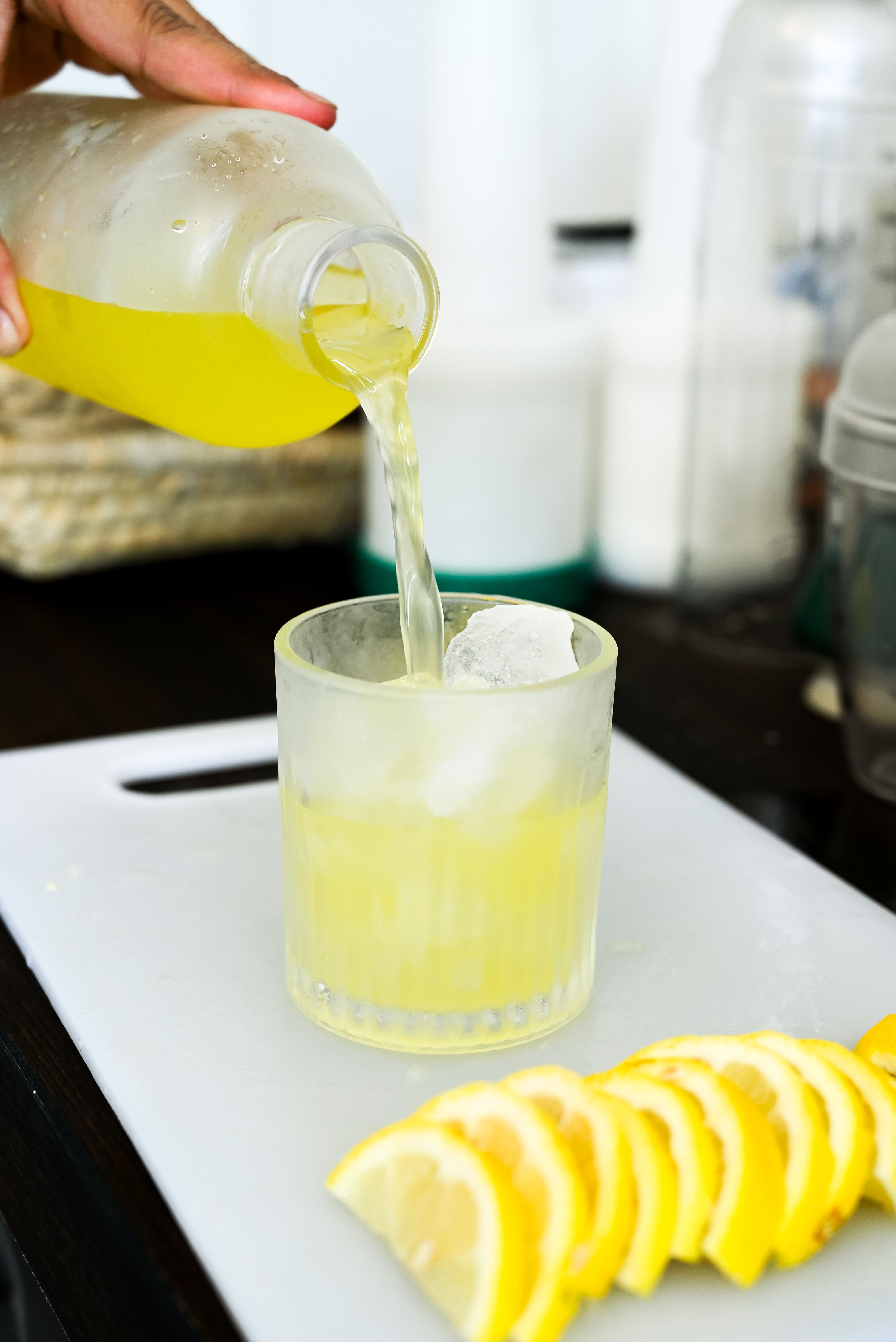 Refreshing Lemon Juice Being Poured into Glass · Free Stock Photo