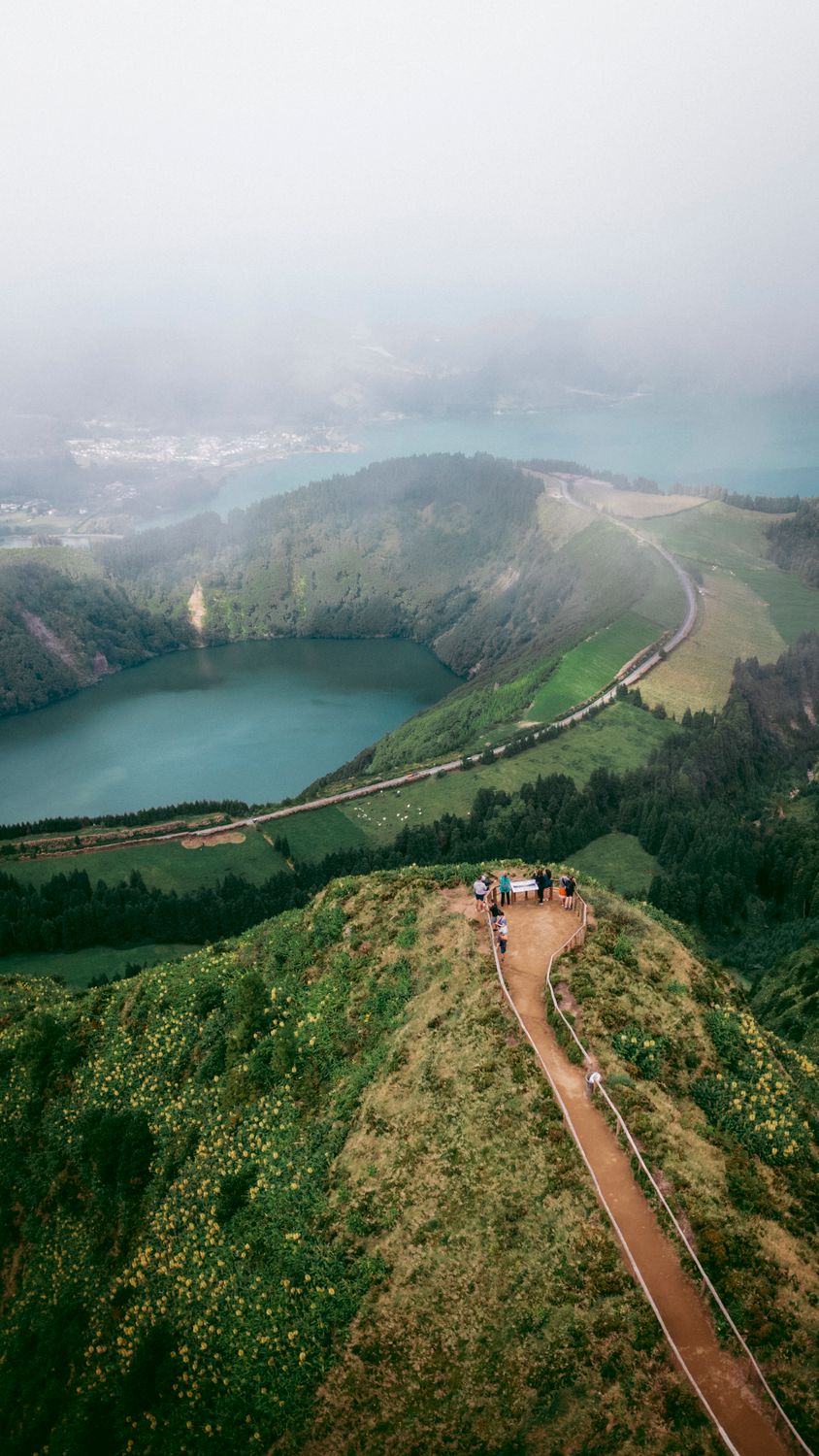 Aerial view of the twin volcanic lakes of Sete Cidades surrounded by lush green landscape in the Azores