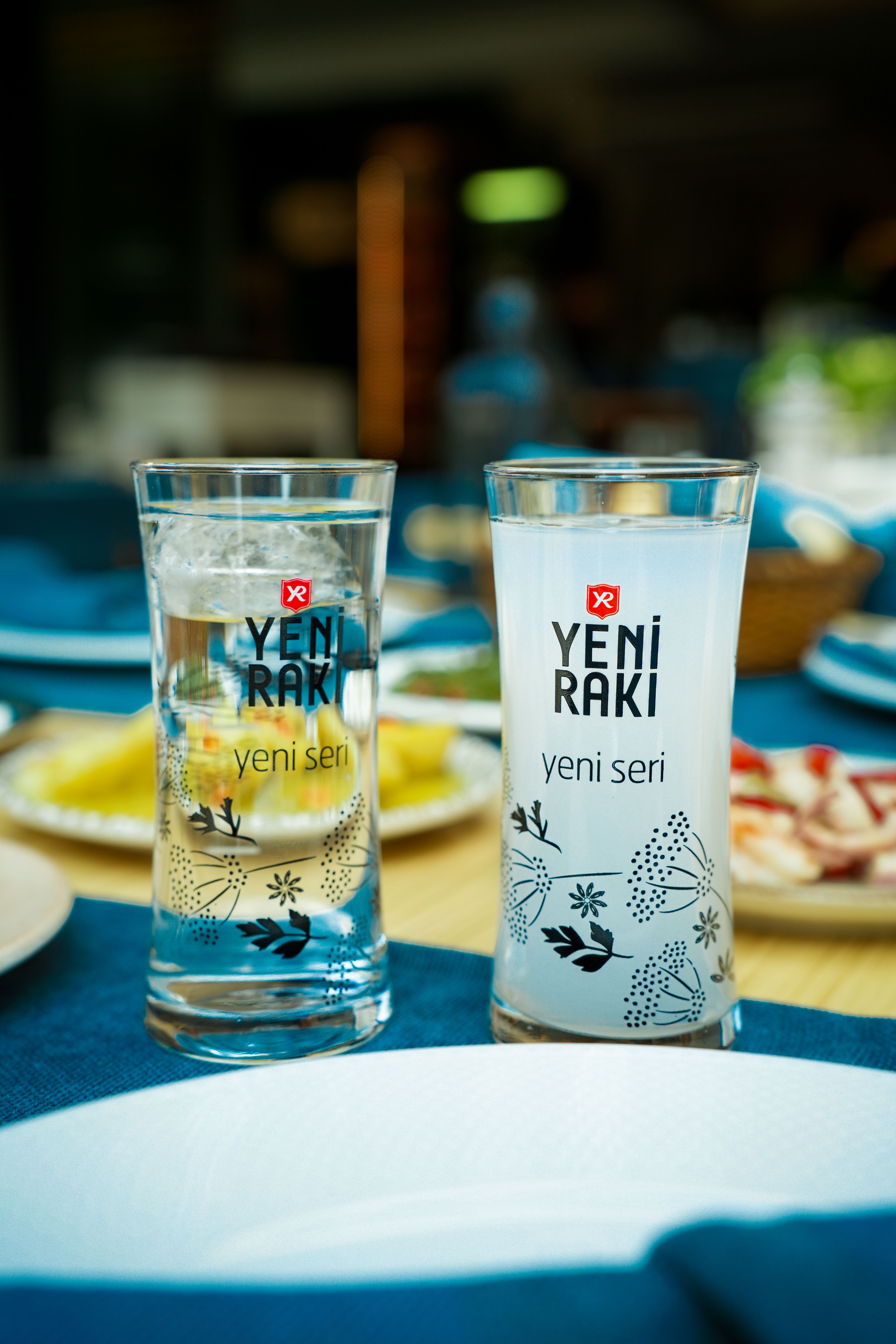Turkish Rakı Glasses on a Restaurant Table · Free Stock Photo