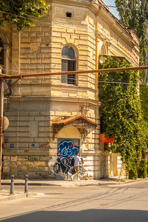 Free Street view of a historic building with graffiti art in Tbilisi, Georgia, during summer. Stock Photo