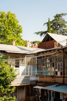 View of traditional Georgian buildings in Tbilisi, showcasing unique architecture.