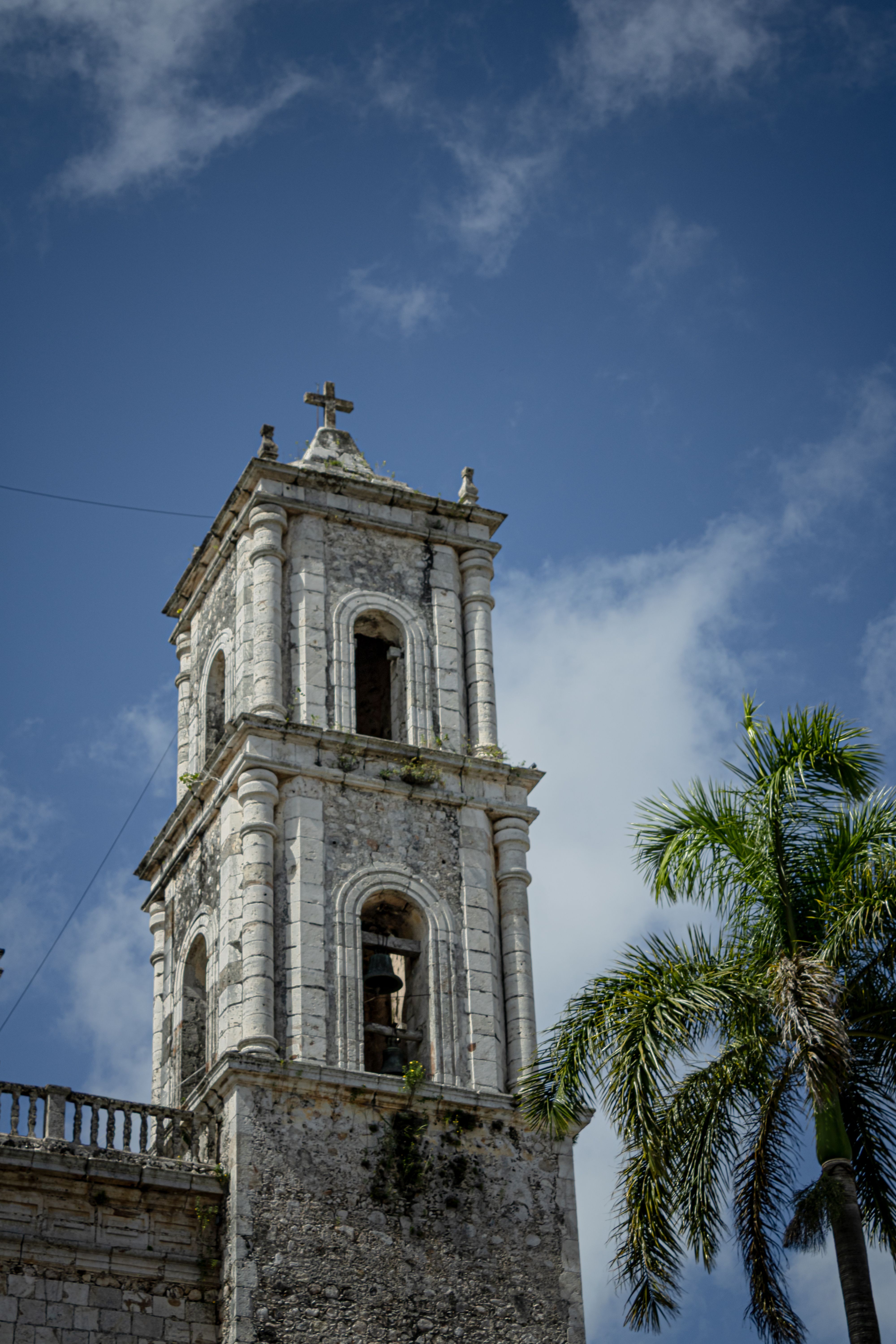 Historic Church Tower Under Blue Sky · Free Stock Photo