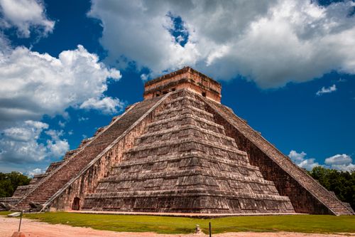 Free Stunning view of the pyramid at Chichén Itzá in Mexico with vibrant skies. Stock Photo