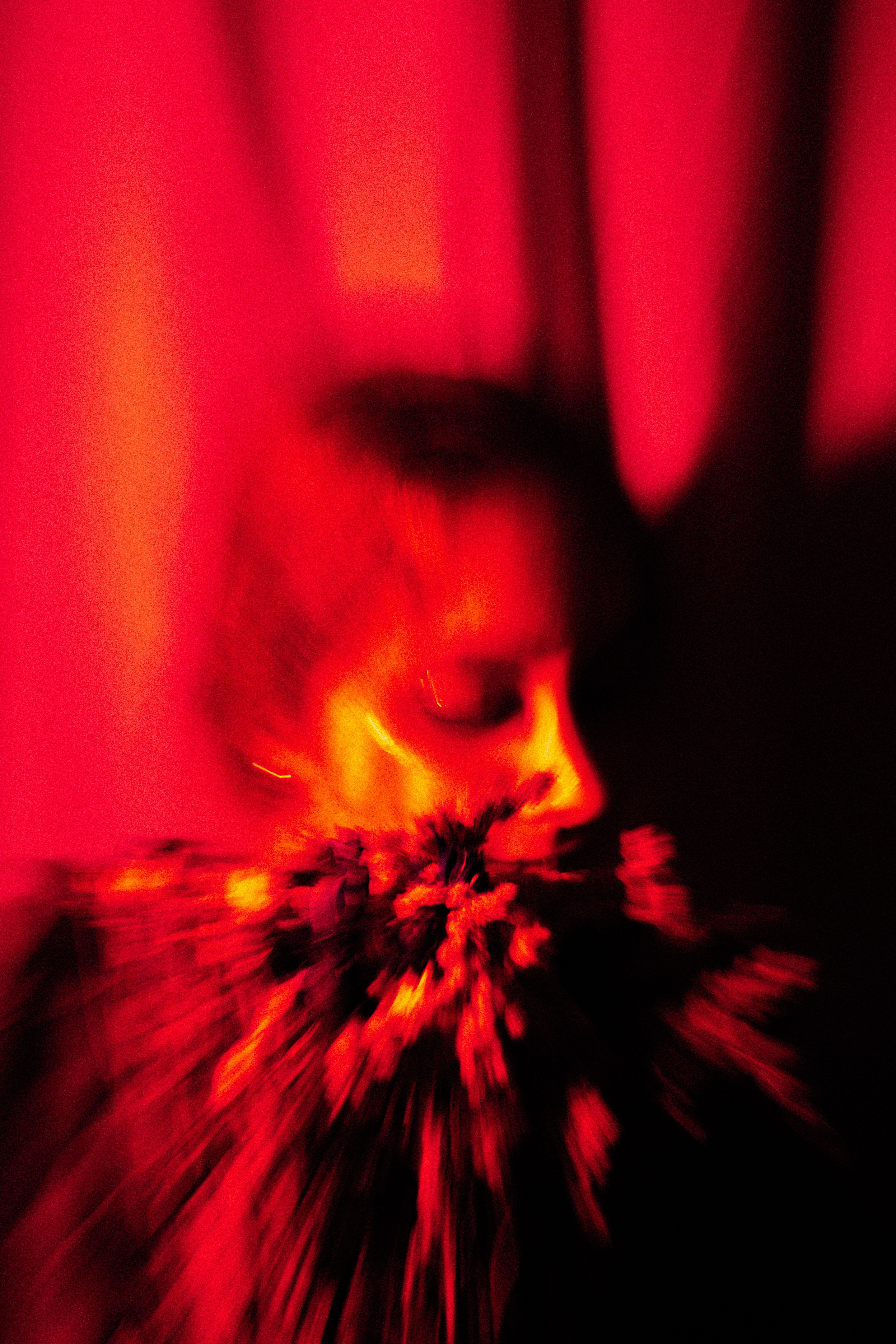 Artistic Blurred Portrait with Red Lighting · Free Stock Photo
