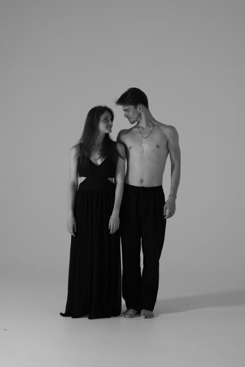 Free Elegant black and white portrait of a young couple posing together. Stock Photo