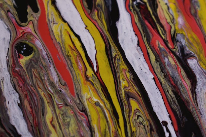 Movie theater audience looking at a pre-show cinema advertising QR code on the big screen