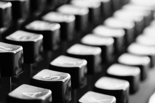 Free Artistic black and white close-up of vintage typewriter keys, emphasizing nostalgia and classic design. Stock Photo