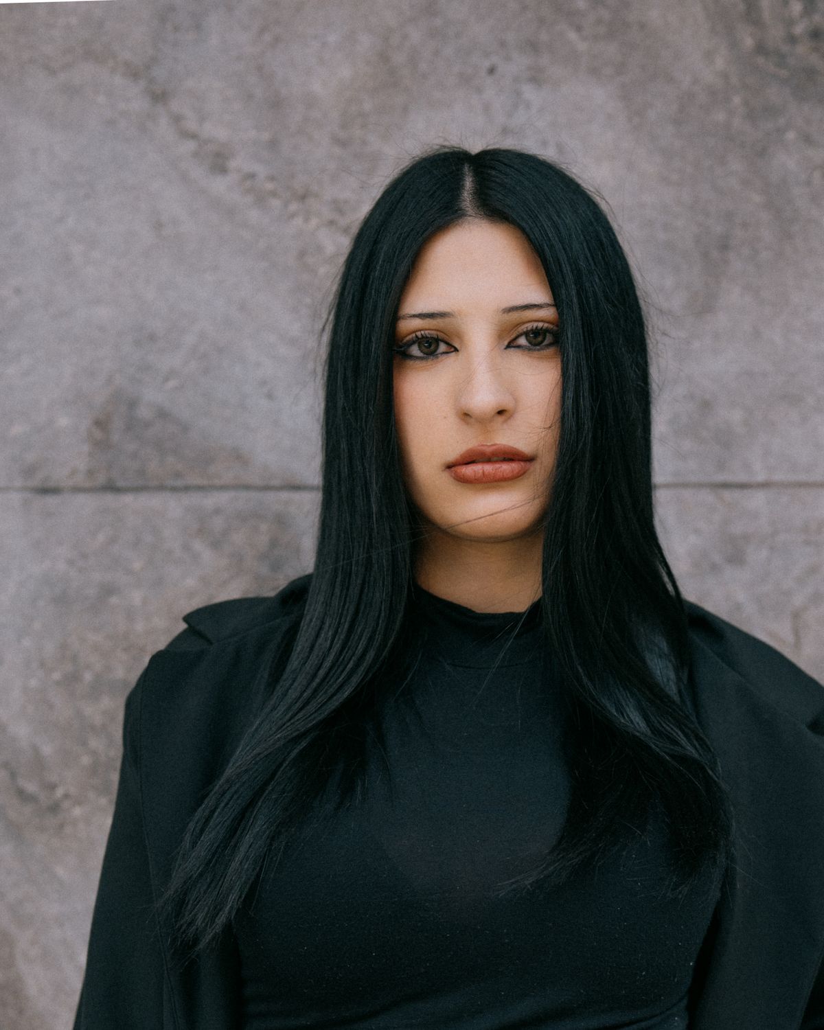 Model with long straight black hair