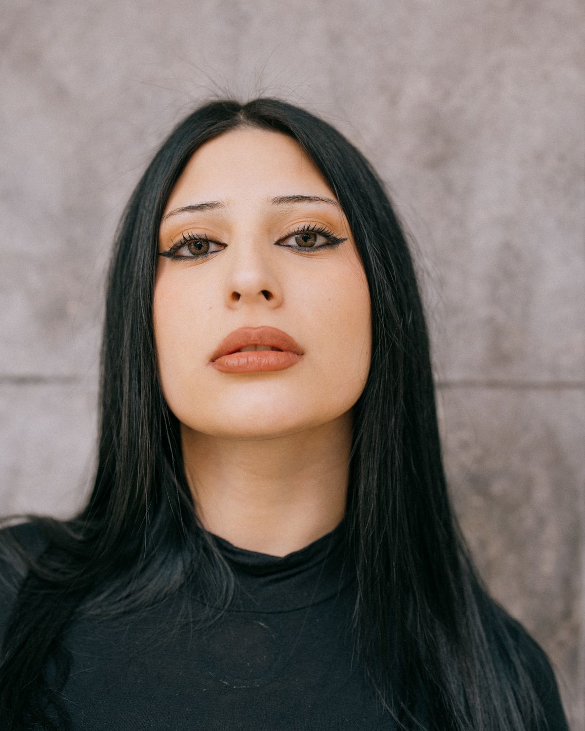 Woman with long straight black hair