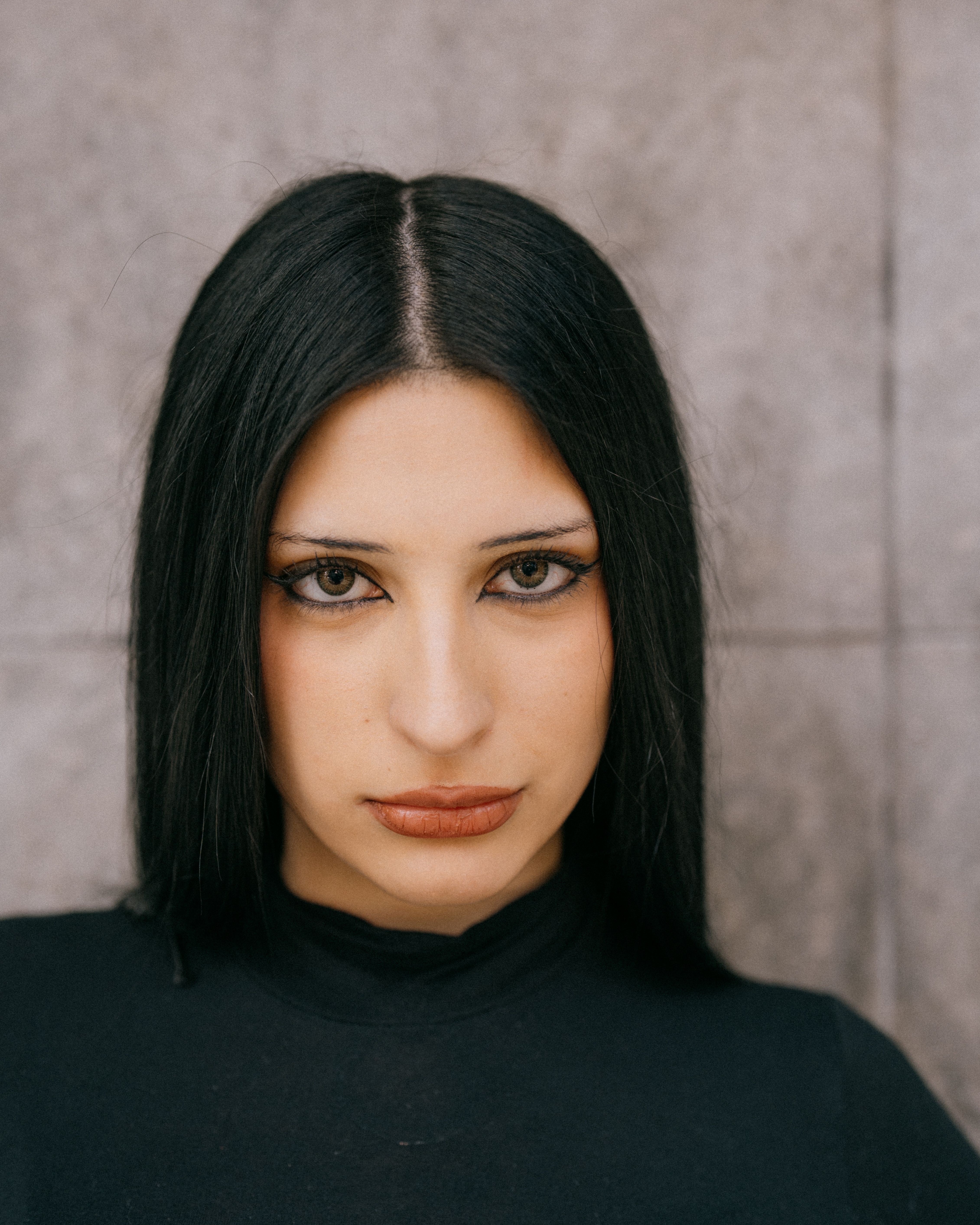 Portrait of Woman with Intense Gaze · Free Stock Photo