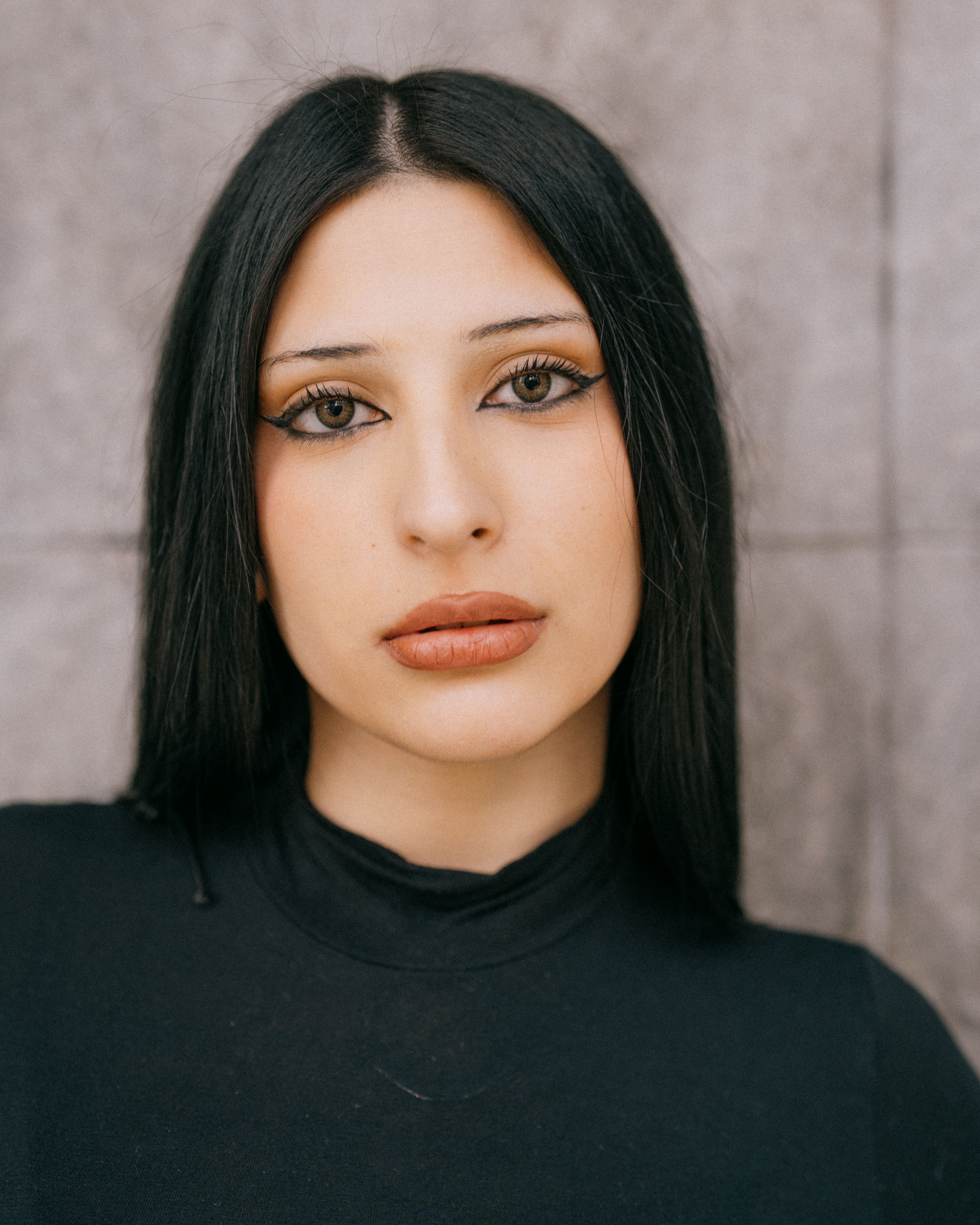 Close-up portrait of a woman with striking makeup in Buenos Aires, Argentina.