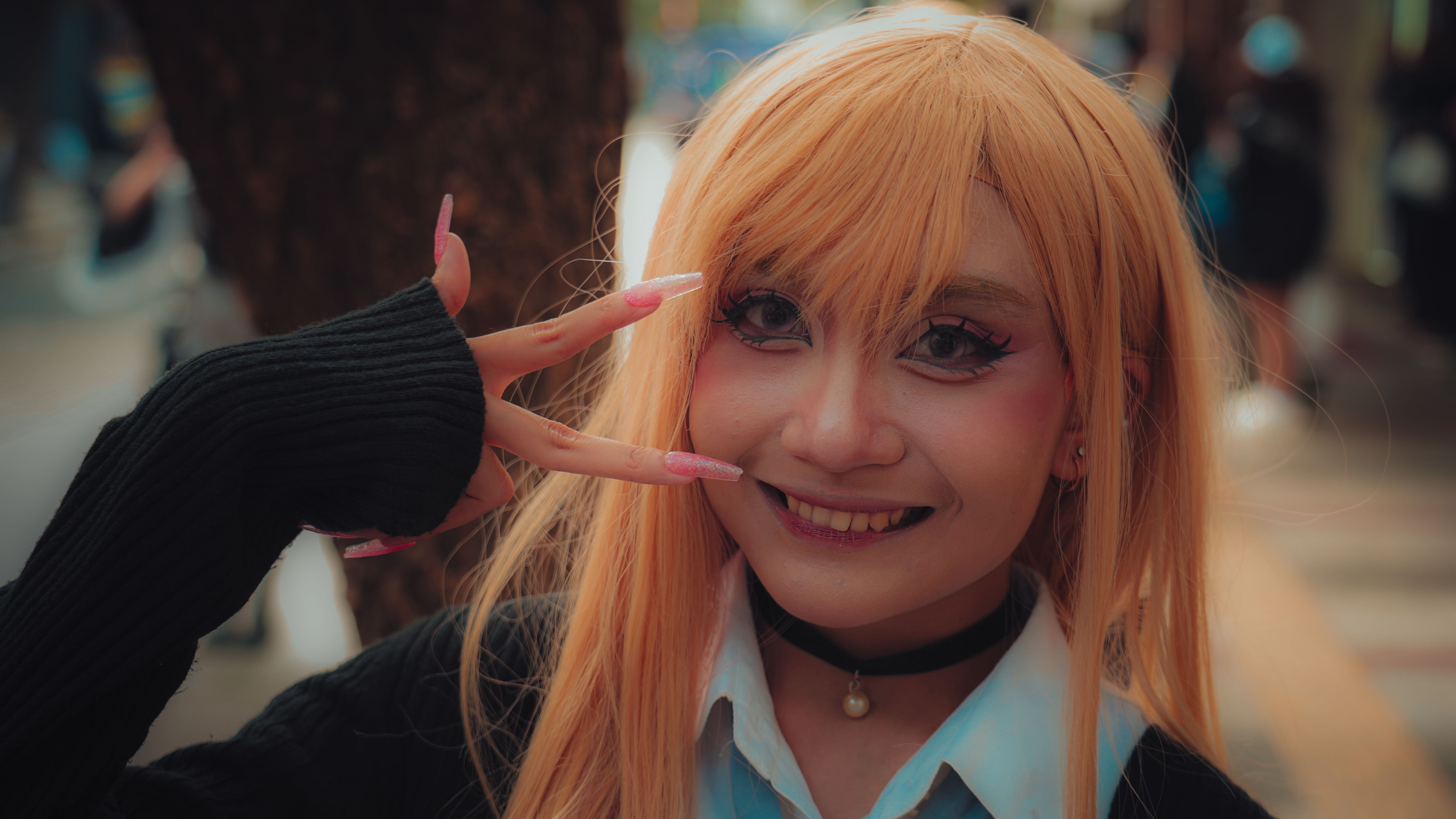 Cosplay Portrait with Cheerful Gesture Outdoors