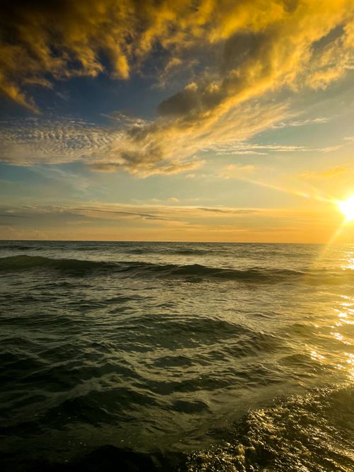 Free Sunset From Ocean Stock Photo