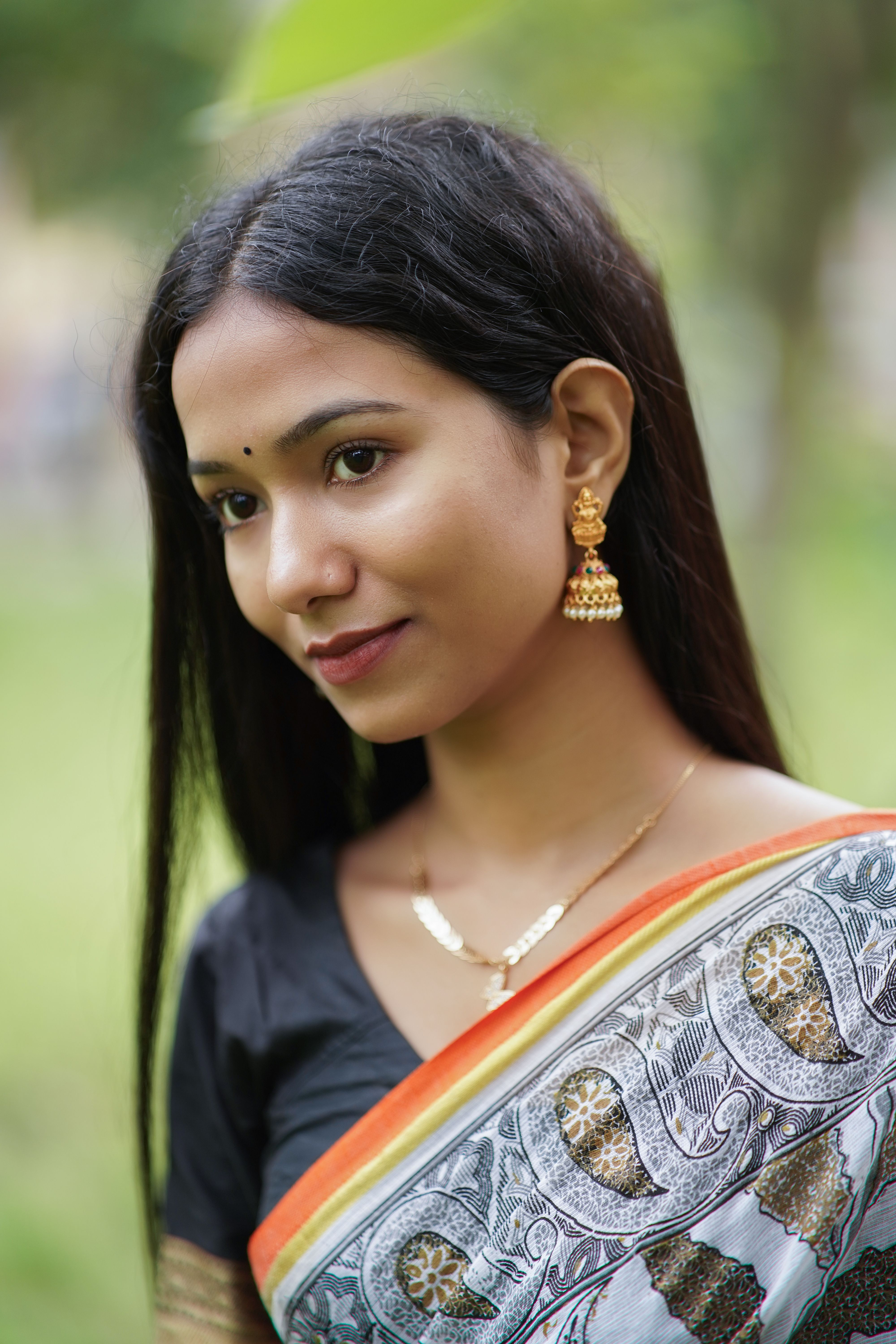 Elegant Portrait of a Woman in Traditional Attire · Free Stock Photo