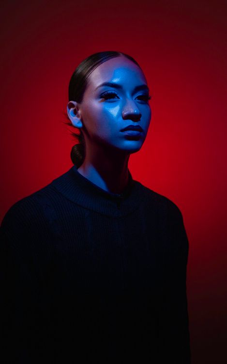 Dramatic Portrait with Red and Blue Lighting · Free Stock Photo