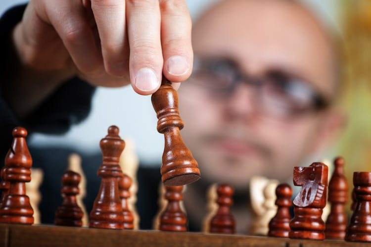 Shallow Focus Photography Of Chess Pieces