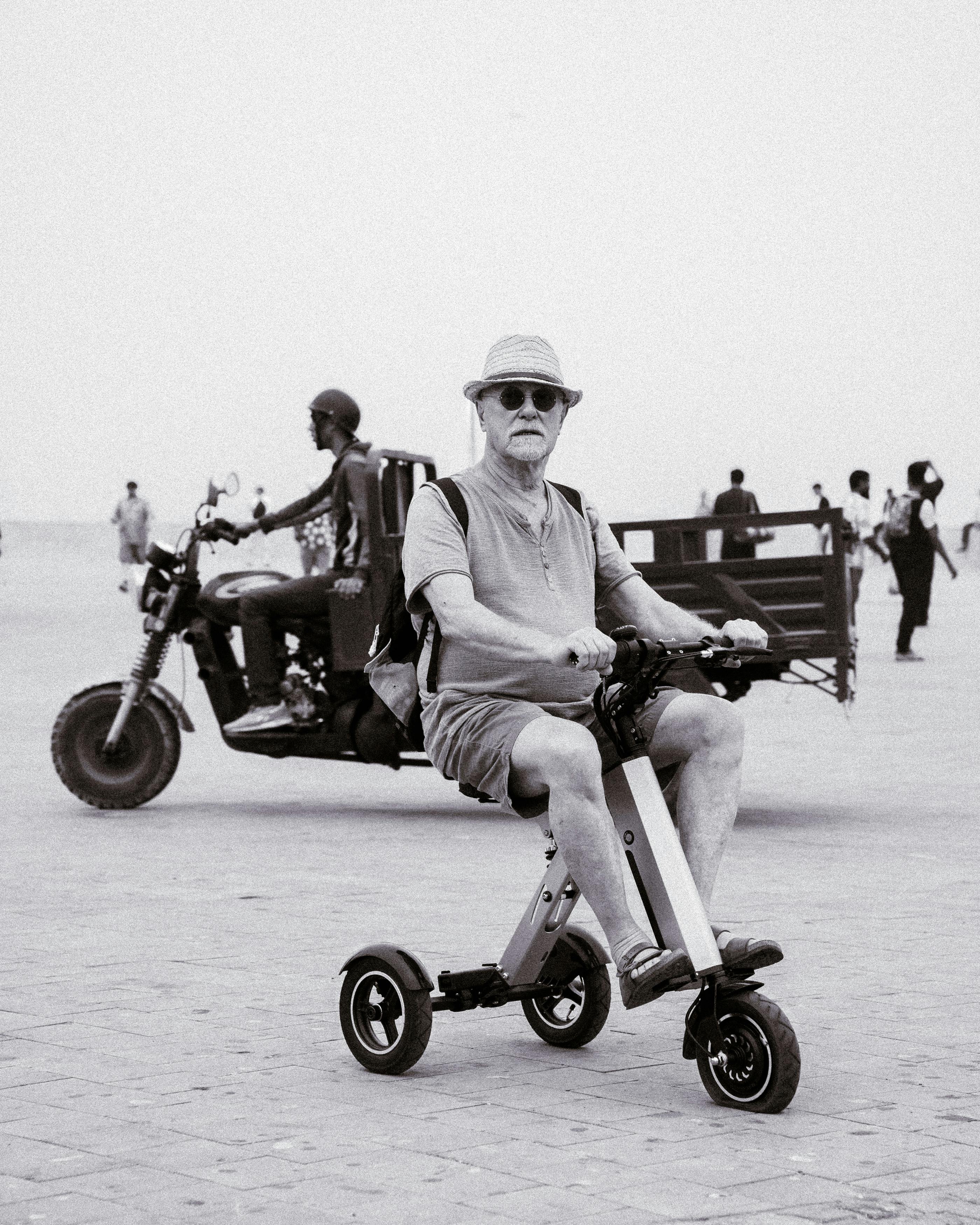 Senior discussing mobility scooter financing options