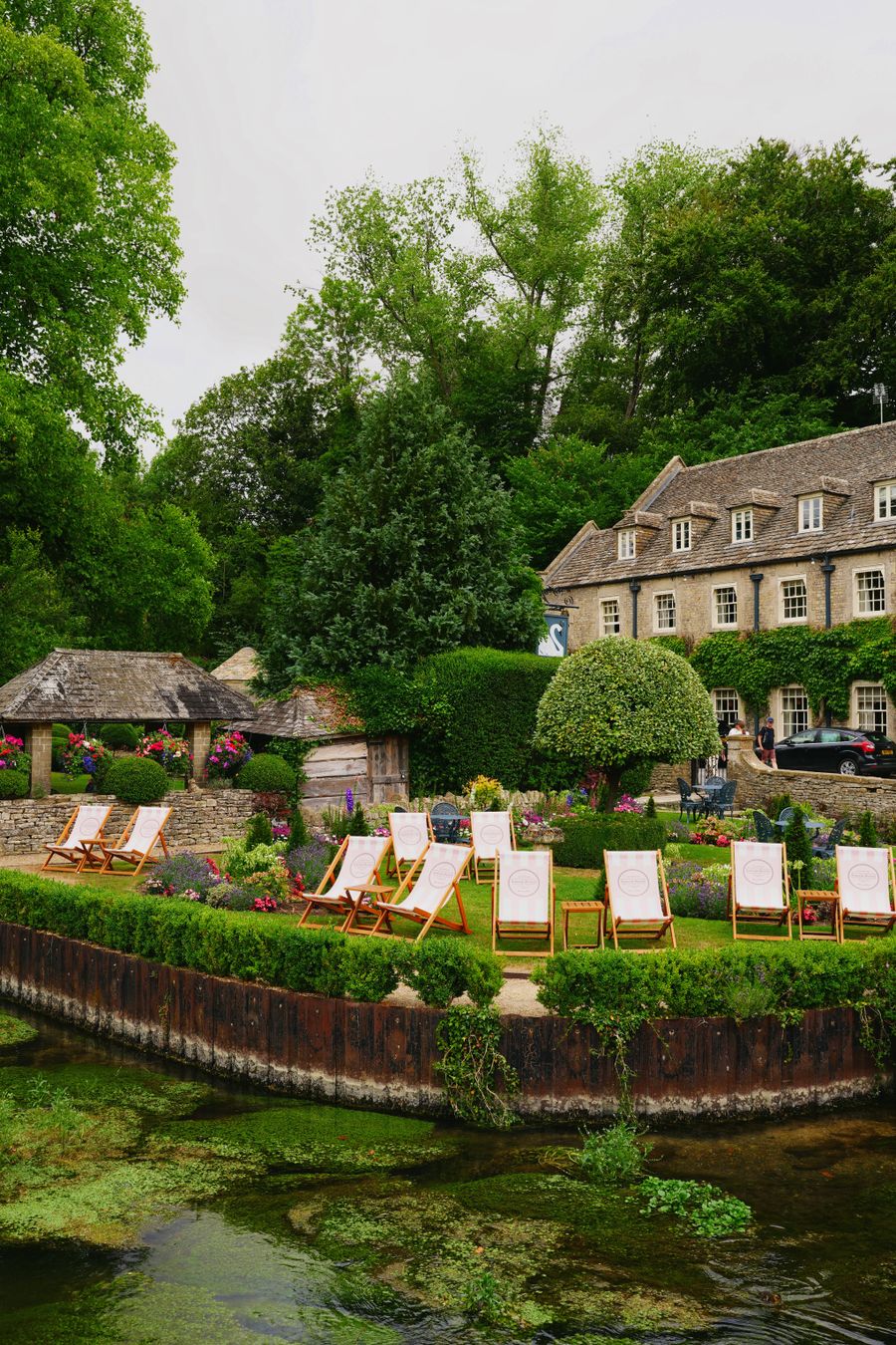 Cotswolds English garden with deckchairs