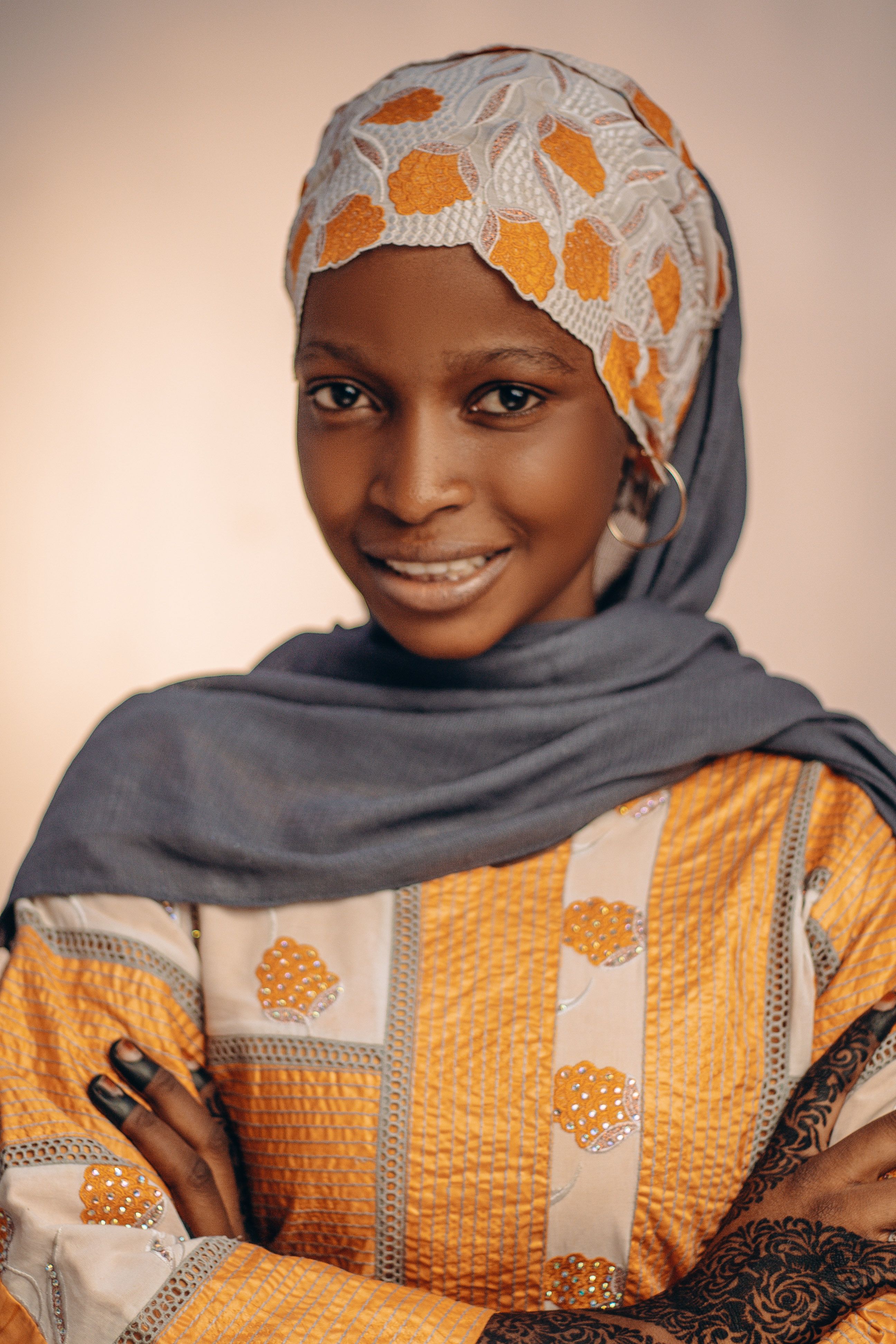 Smiling Woman in Traditional Clothing Portrait · Free Stock Photo
