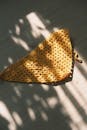 Sunlit Crochet Cloth with Artistic Shadows