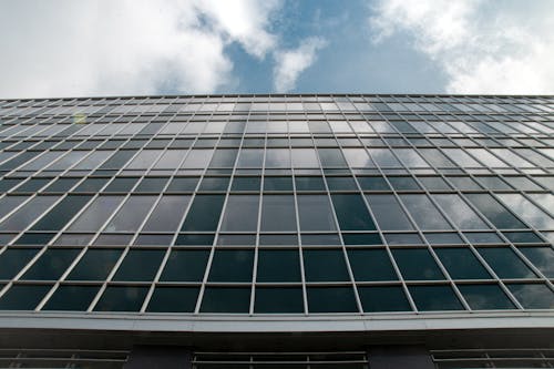 Glass Building Under Blue Sky