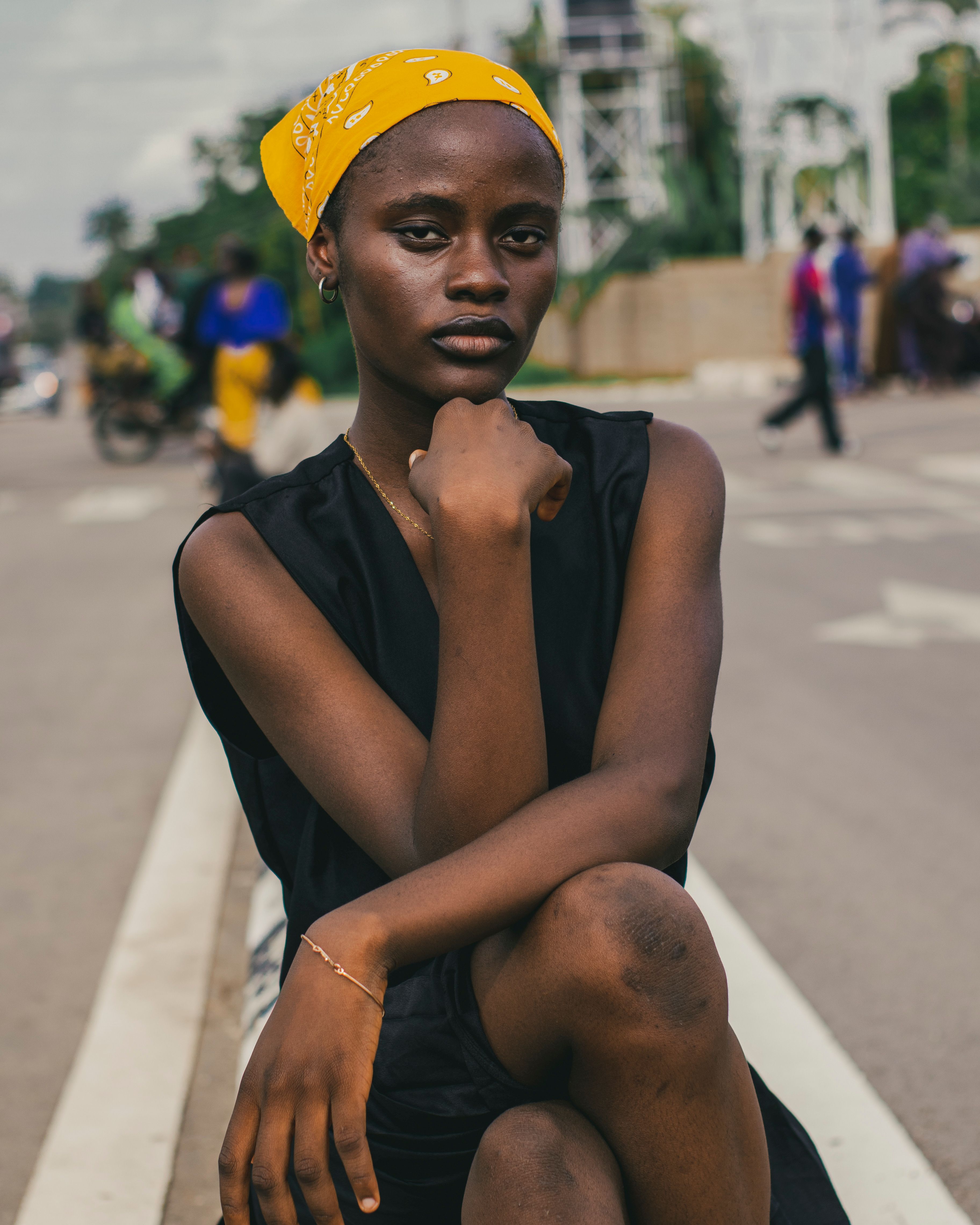 Portrait of a Young Woman on Urban Street · Free Stock Photo