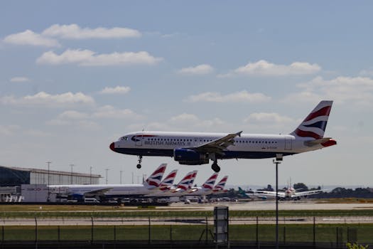 British Airways Airbus A320 landing at Heathrow, London on a clear day.