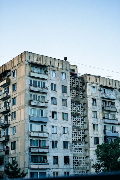Free A Soviet-era apartment building showcasing urban decay in Tbilisi, Georgia. Stock Photo