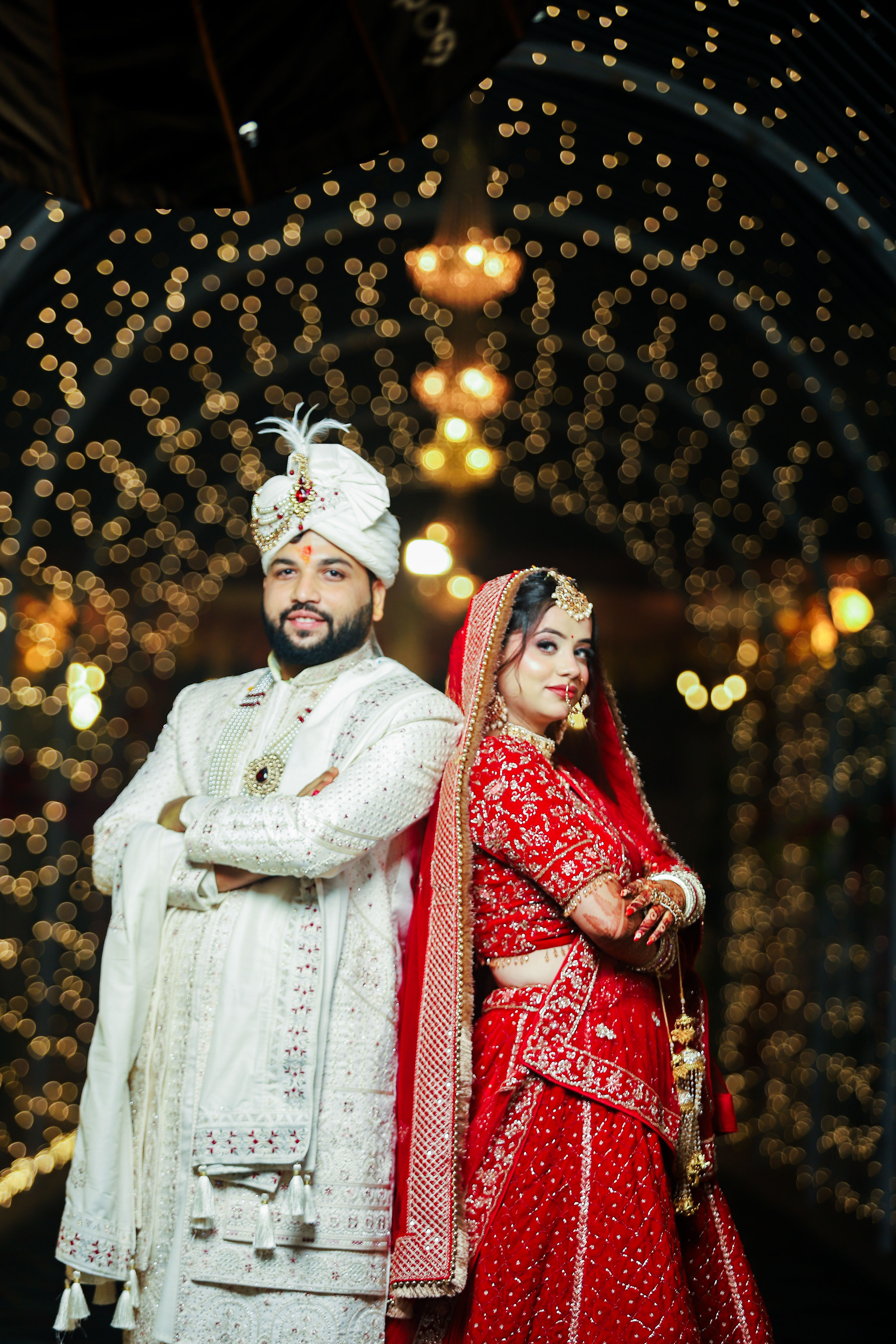 Elegant Indian Wedding Couple in Traditional Attire · Free Stock Photo