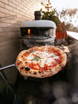Close-up of a wood-fired oven pizza with fresh ingredients in London, capturing the essence of gourmet cooking.