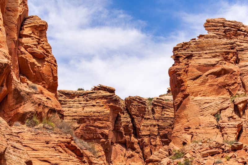 Explore the stunning rock formations of a desert canyon in Arizona, showcasing intricate erosion patterns and vibrant colors.