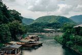 Wooden boat on a river bend — photo by Lorenzo Castellino on Pexels