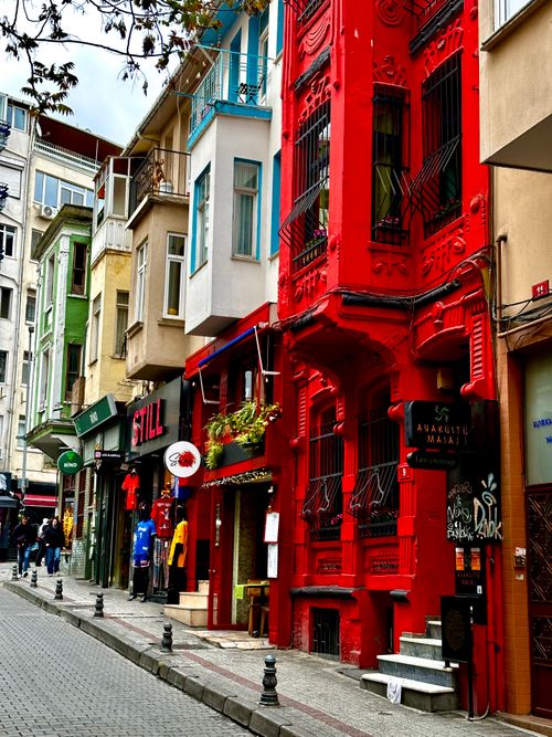 Free Explore the colorful architectural charm of a bustling street in İstanbul, Türkiye. Stock Photo
