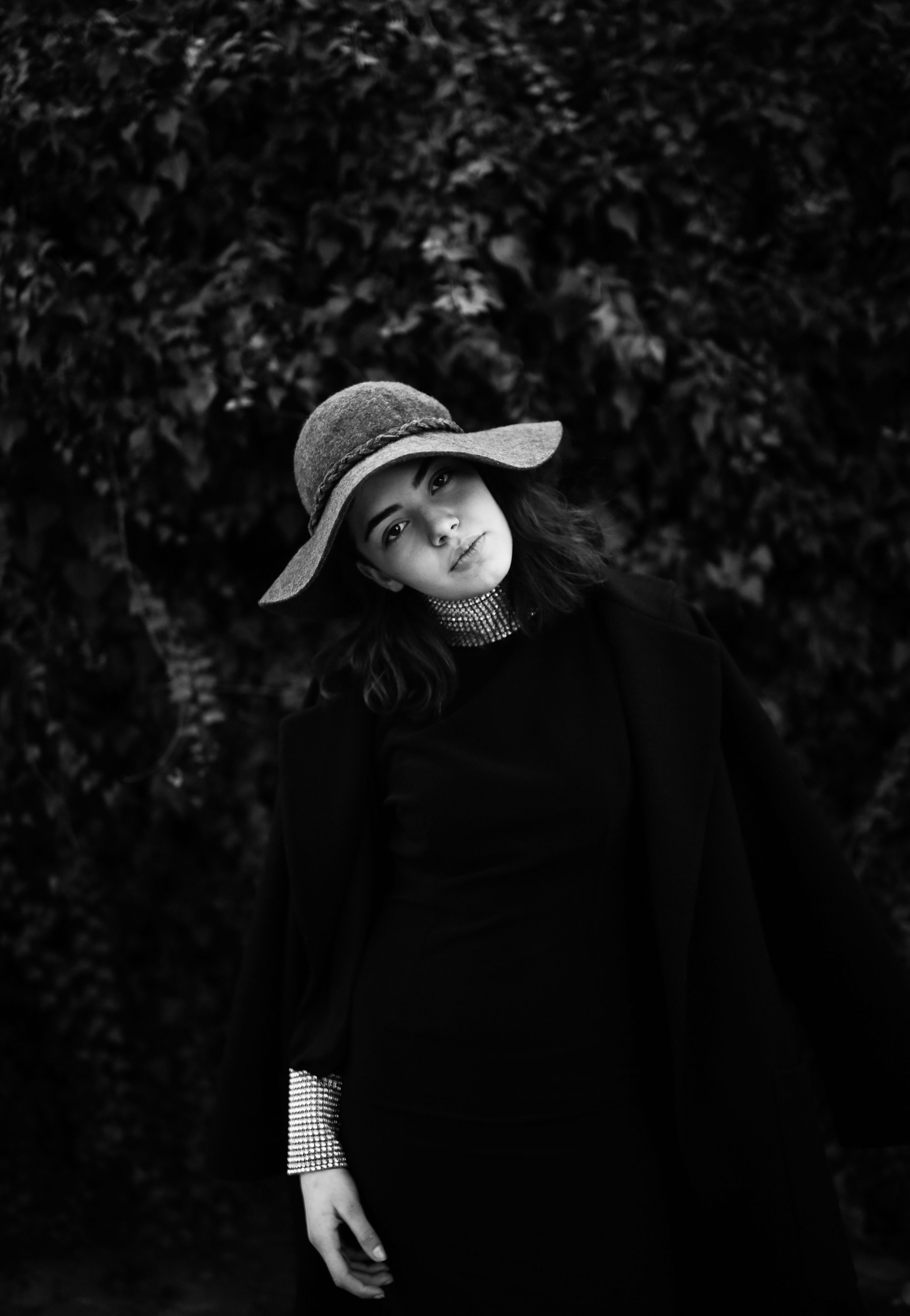 Moody Black and White Portrait of a Woman Outdoors · Free Stock Photo