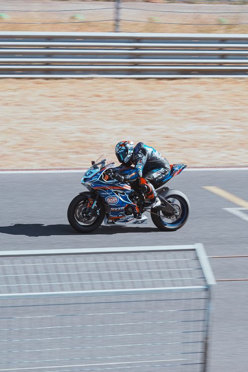 Asphat Motorcycle Racing High-Speed Motorcycle Race on Asphalt Track · Free Stock Photo
