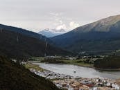 Scenic Tibetan Valley with Snow-capped Mountains