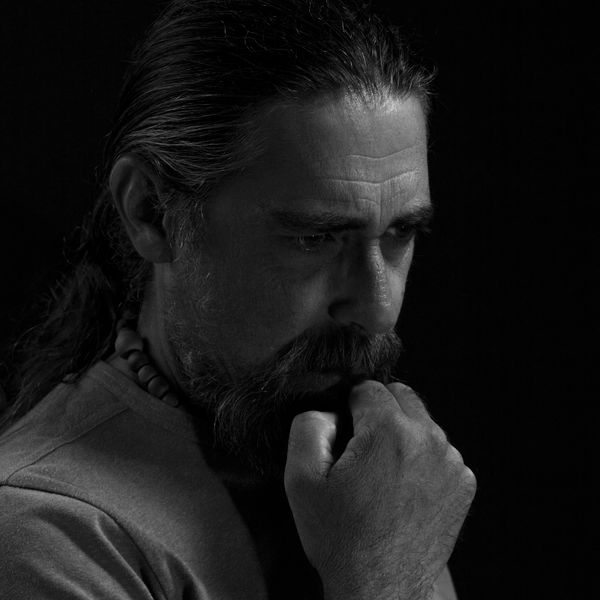 Black and white portrait of a contemplative man — photo by Gilles Quertier on Pexels
