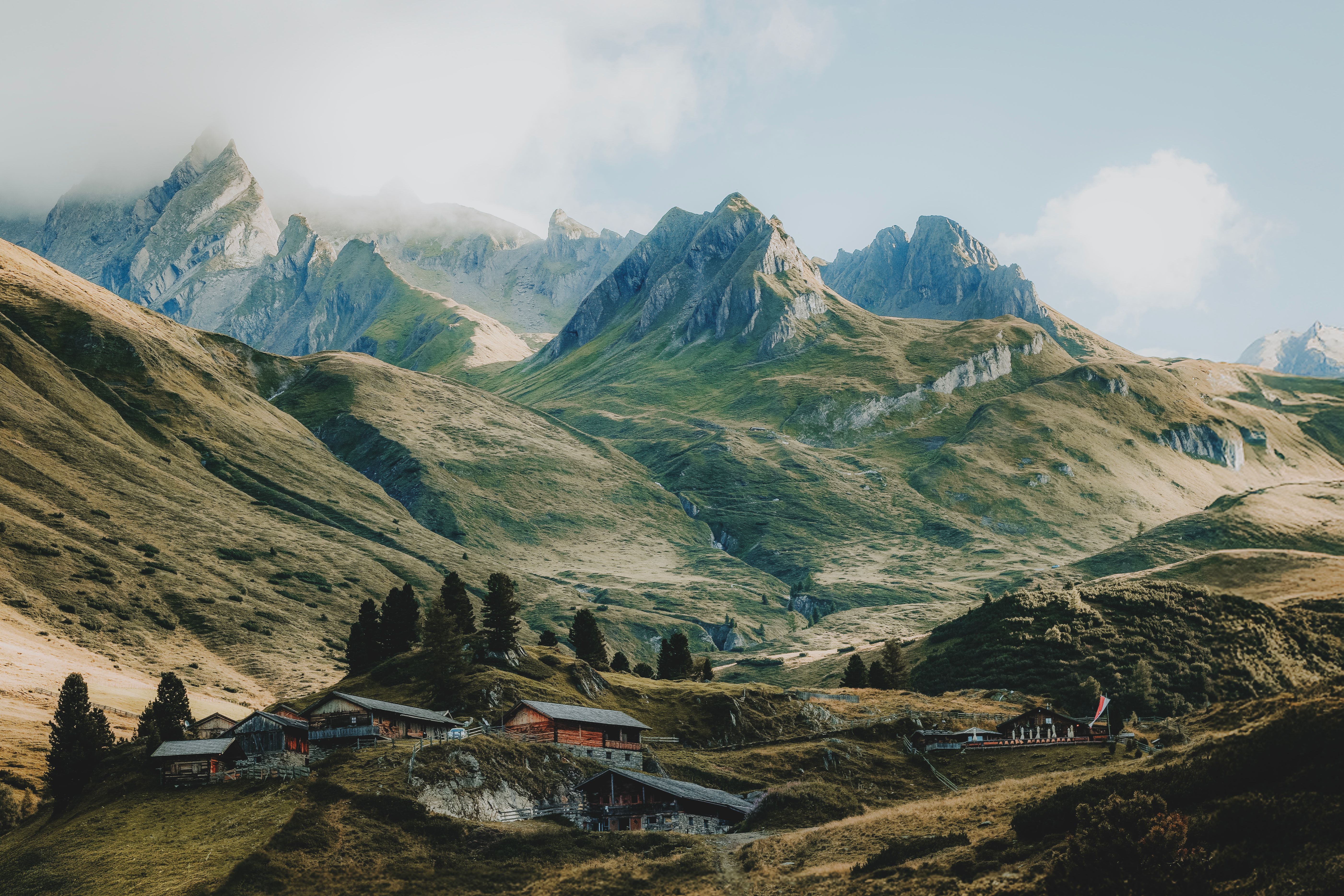 Scenic Alpine Village in Mountain Valley · Free Stock Photo