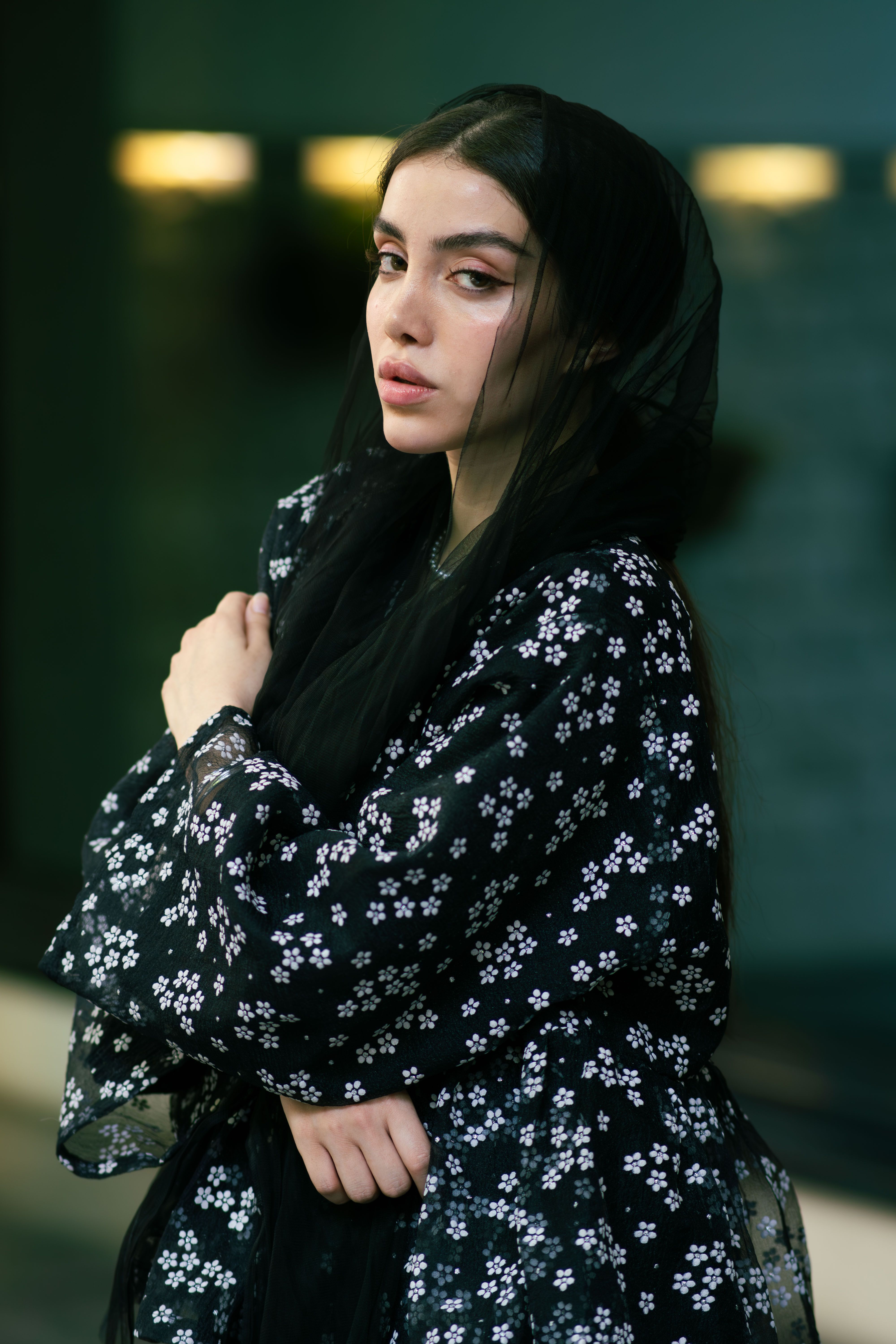 Elegant Woman in Floral Dress Portrait · Free Stock Photo